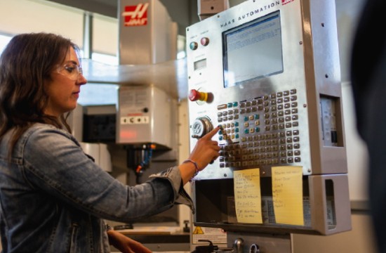 Digital Manufacturing Student working manufacturing hardware