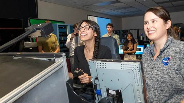 NASA community college aerospace scholars participate in an activity at NASA