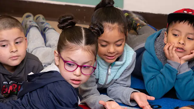 Young children in an early childhood classroom