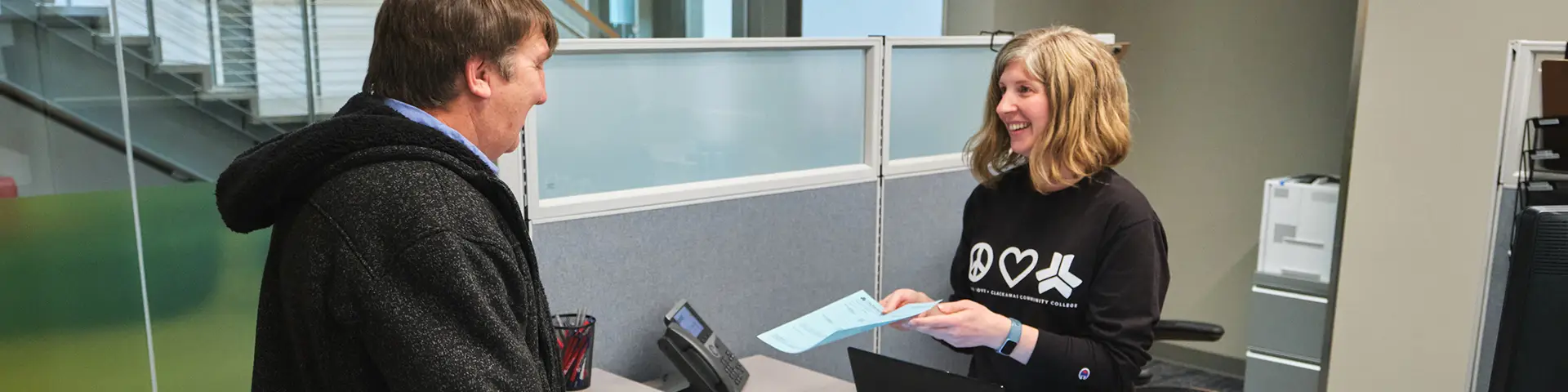 Student getting help at the Refunds office at CCC