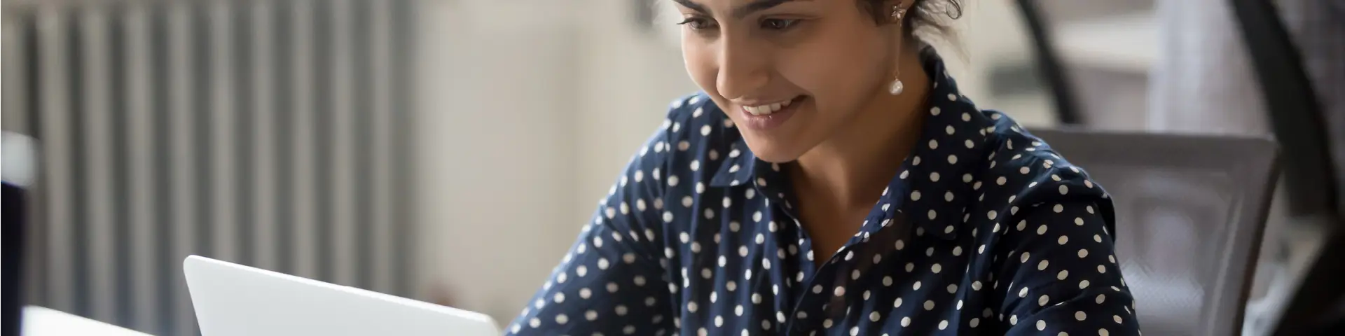 Office worker working on a laptop