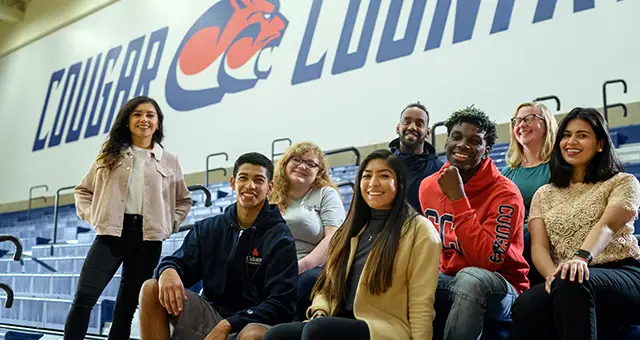 Group of students pose in the Clackamas Community College gym