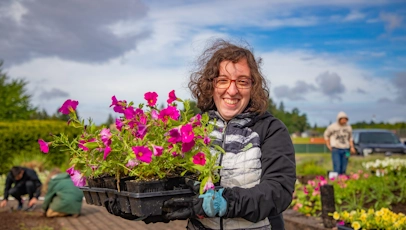 BondSaleNewsPic Person holding flowers