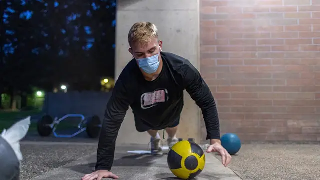 CCC wrestler working out during predawn hours